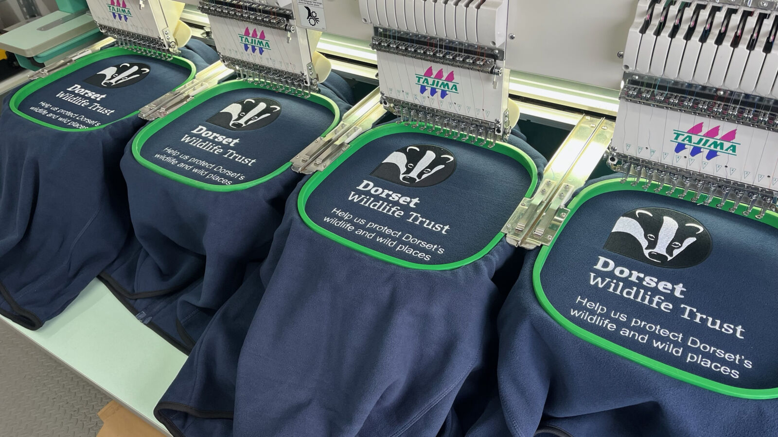 Navy embroidered fleeces with Dorset Wildlife Trust logo