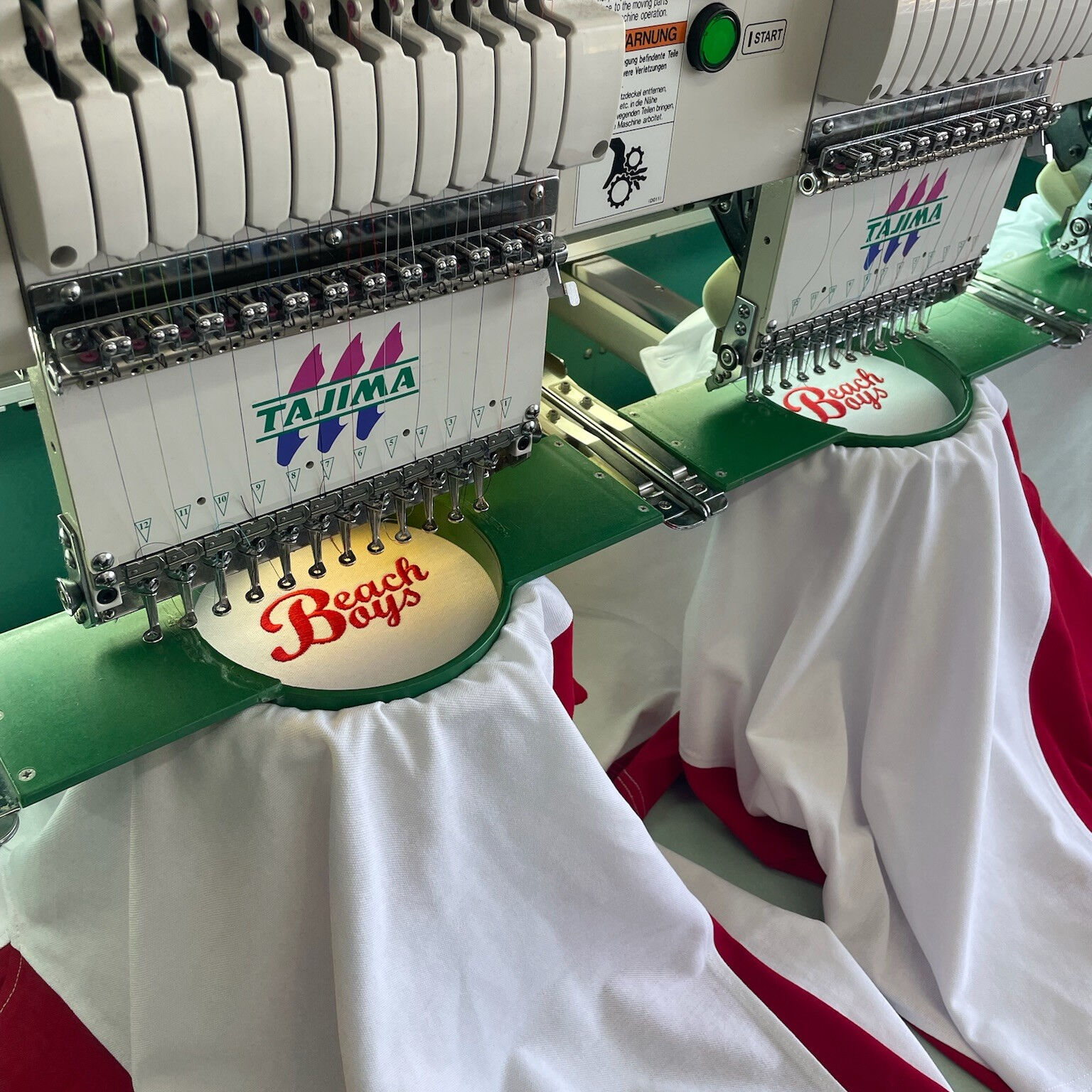 White polo shirt with embroidered text