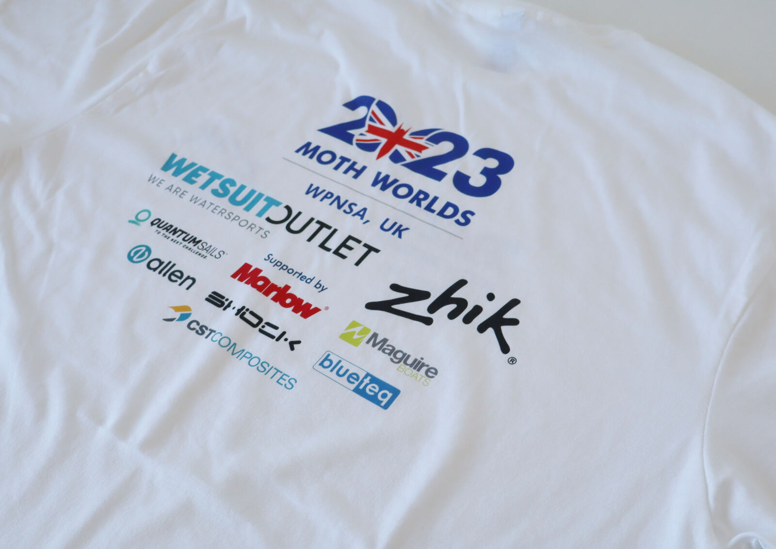 White t-shirt with detailed printed logos